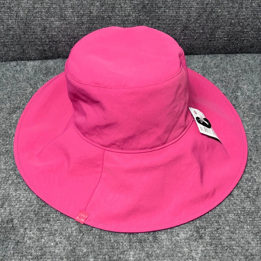 Lululemon Wide Brim Logo Bucket Hat Pink Water Repellent Sun Hat S/M NEW